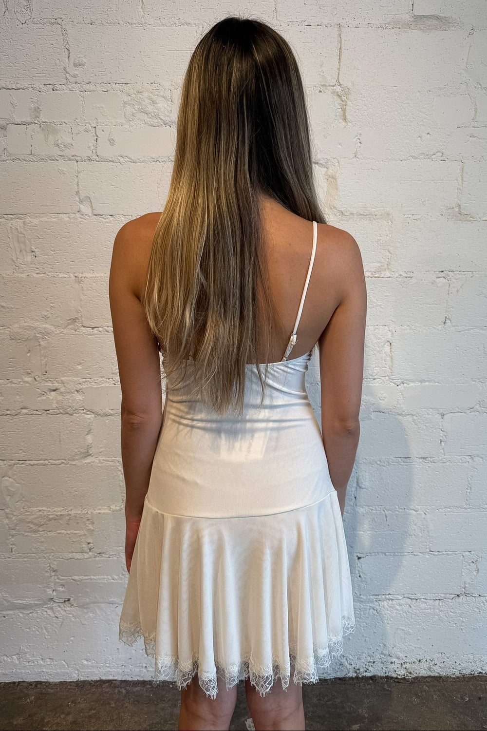 ivory mini dress with ruffled hem 