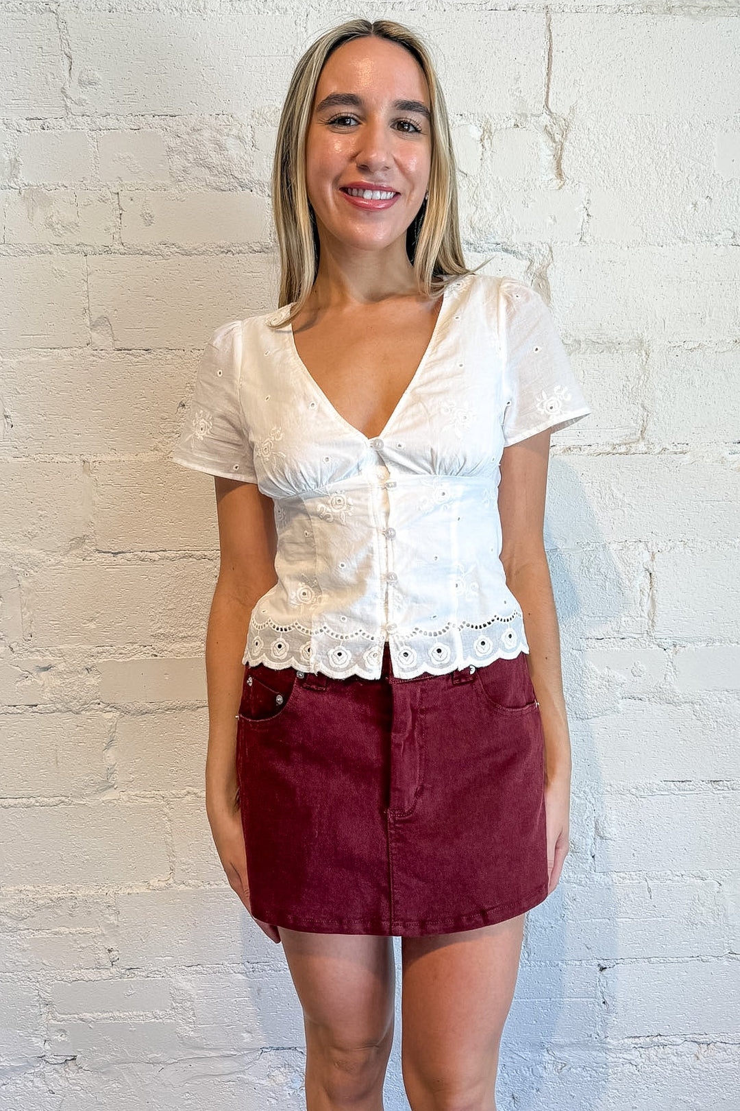 Maroon denim mini skort with built-in shorts for gameday