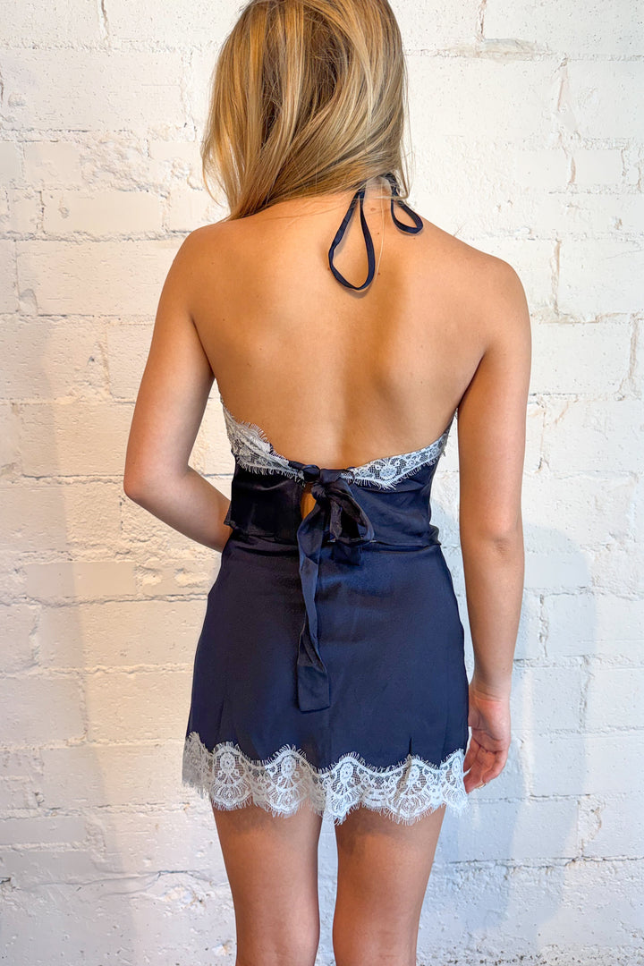 Navy lace trim top for women with feminine lace detailing