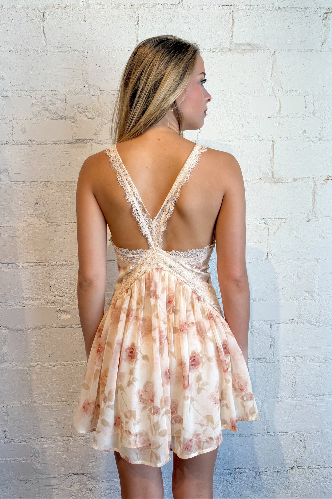Pink floral lace mini dress for women with lace trim and feminine detailing