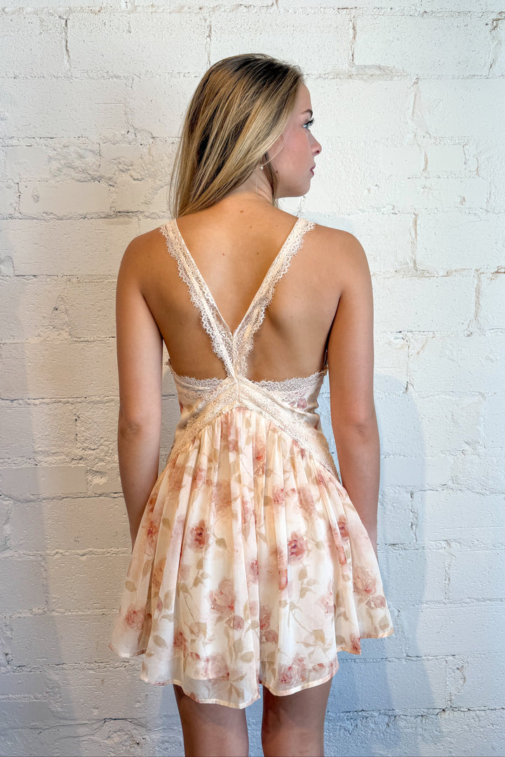 Pink floral lace mini dress for women with lace trim and feminine detailing